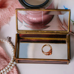 Elegant vintage Via Vermont glass trinket box with handmade Mexican artwork on white surface.
