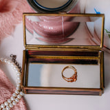 Elegant vintage Via Vermont glass trinket box with handmade Mexican artwork on white surface.