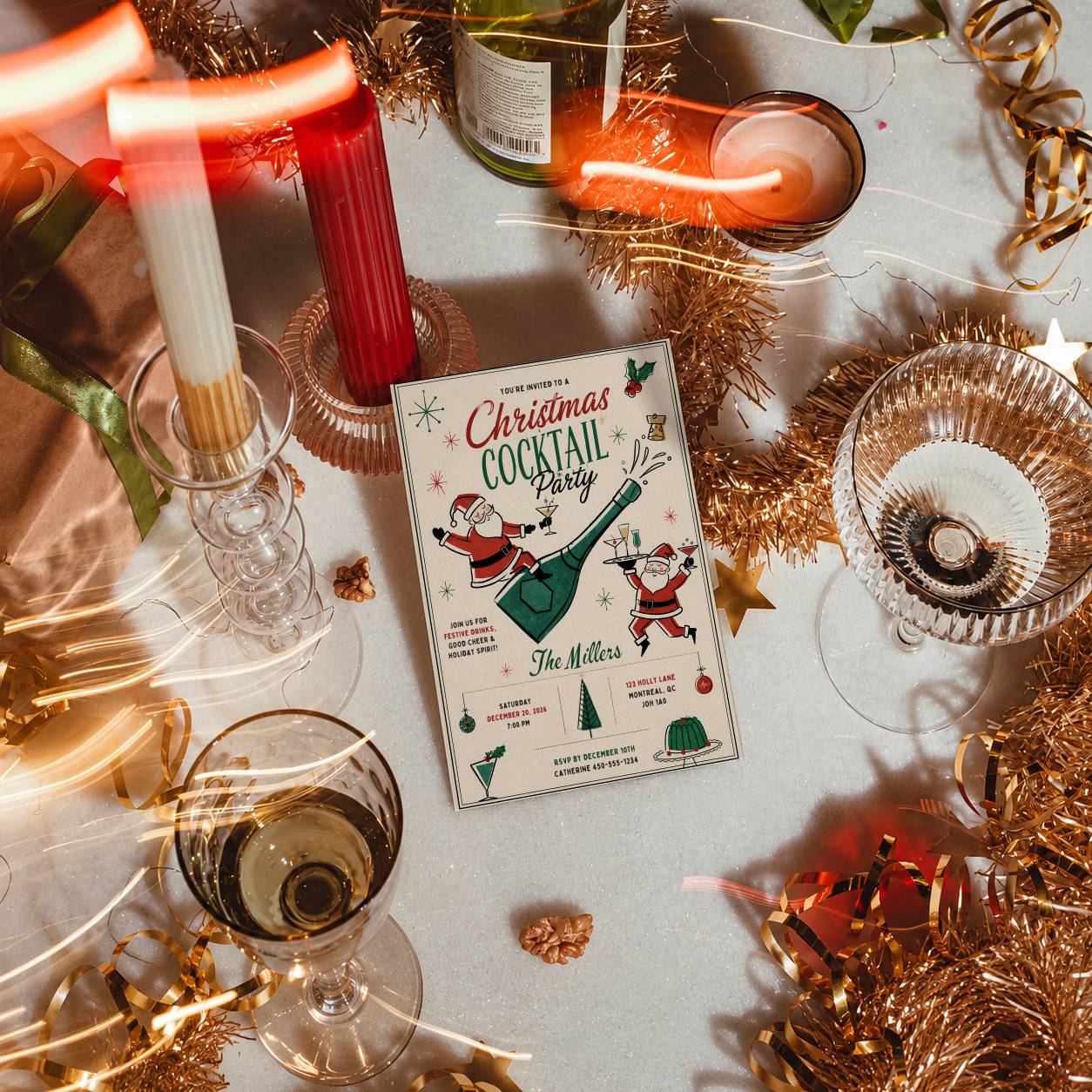 Retro Christmas cocktail party invitation displayed in a festive holiday table setting.