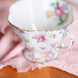 Fine bone china Hammersley teacup and saucer with pastel floral print