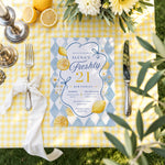 Freshly 21 lemon birthday invitation template shown on a yellow gingham table setting with lemons and daisies