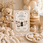Little Boo baby shower invitation displayed beside a teddy bear, cake, cream balloons and ghost-shaped cookies.