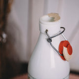 1970s Cerve Italian glass milk bottle close-up, ap open