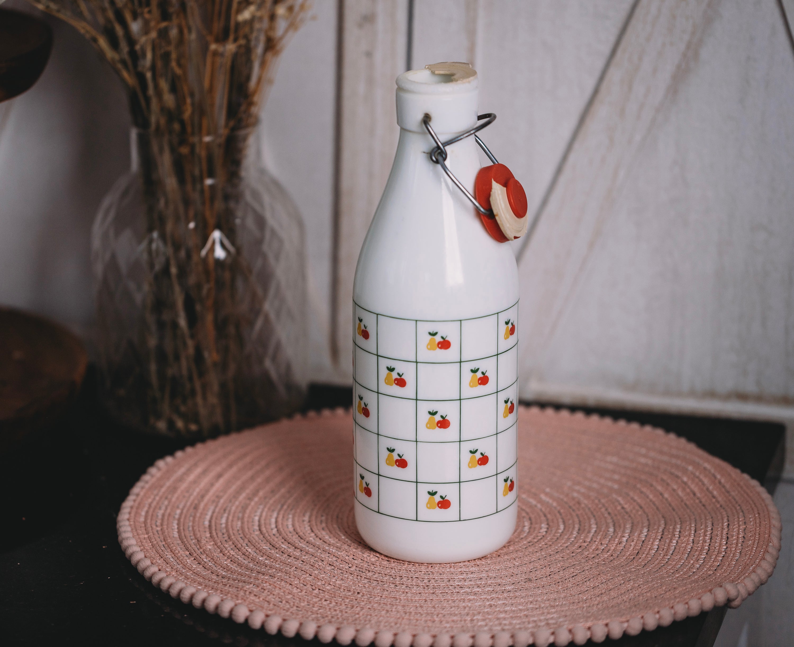 1970s  cerve Italian glass milk bottle close-up, ap open