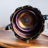 Vintage grape and cable carnival glass biscuit jar with shimmering iridescence