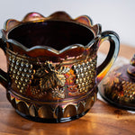 Rare Northwood electric amethyst carnival glass biscuit jar from early 1900s