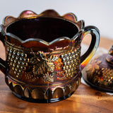 Rare Northwood electric amethyst carnival glass biscuit jar from early 1900s