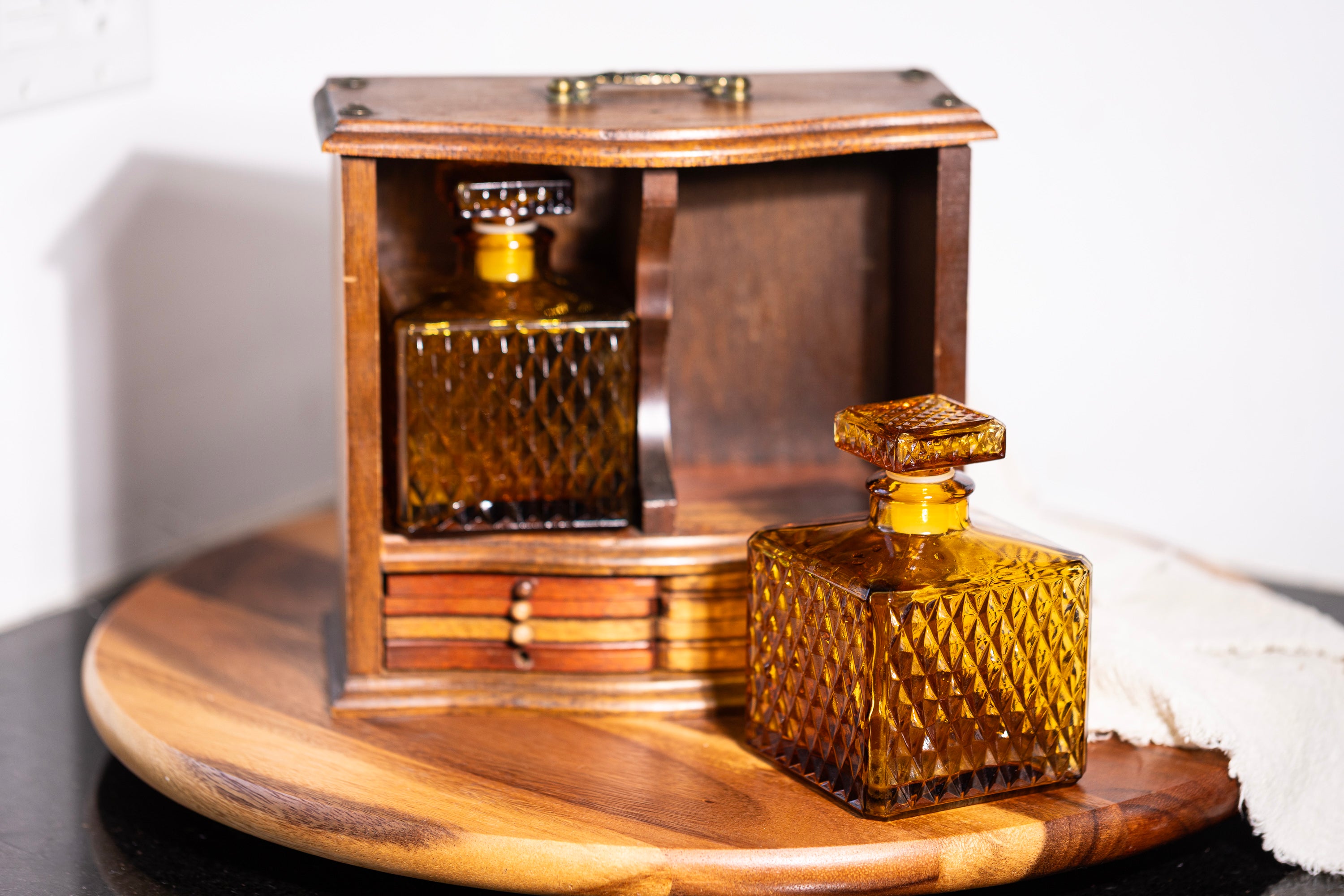 Vintage liquor bottle with geometric textured glass