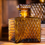Decorative vintage decanter set styled on wooden tray