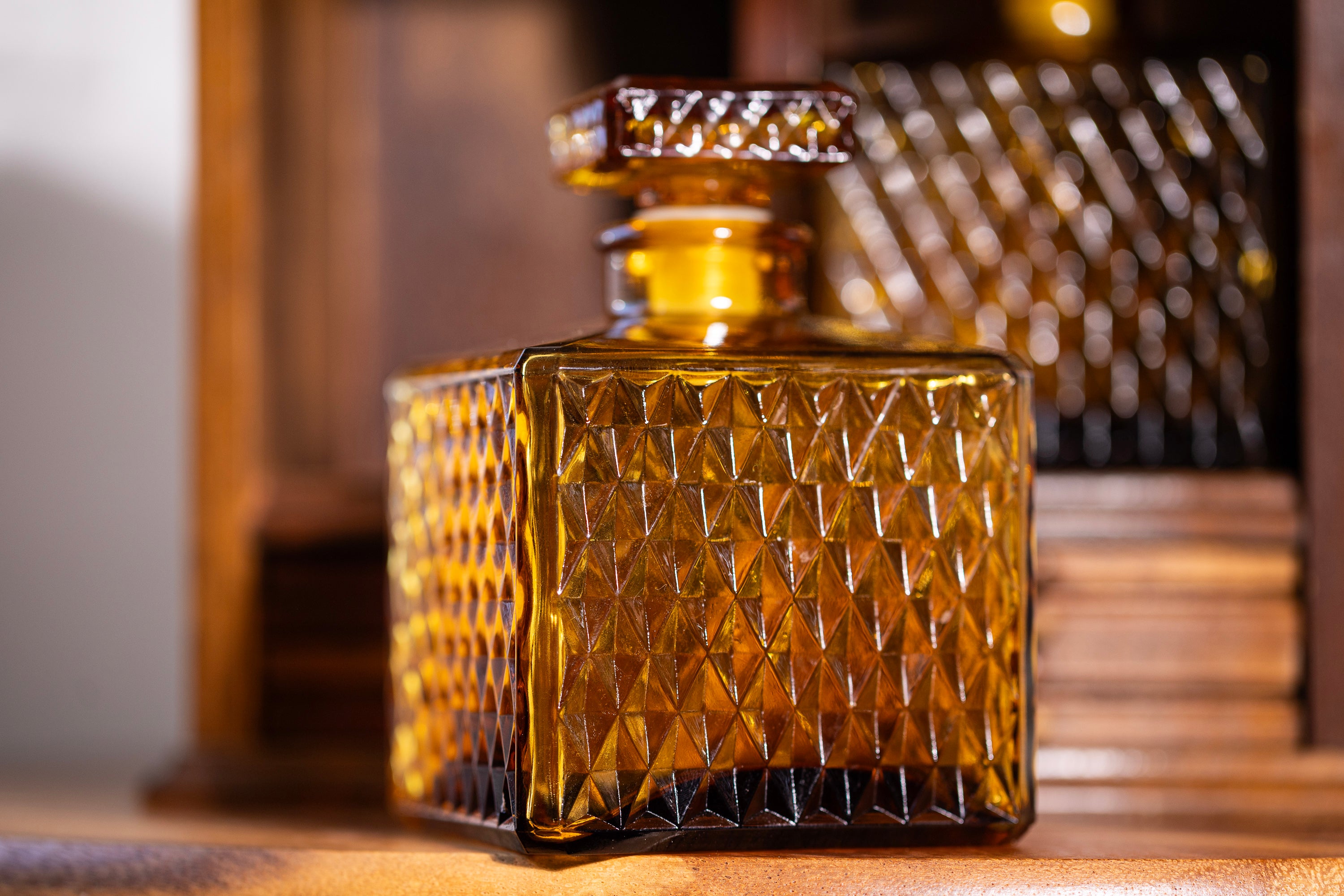 Decorative vintage decanter set styled on wooden tray
