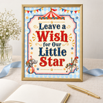 Gold-framed “Leave a Wish for Our Little Star” circus sign beside an open guestbook, gold pen and pale blue ribbon.