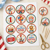 Sheet of 12 vintage circus cupcake topper designs beside scissors, wooden sticks, and assembled elephant and circus tent toppers.