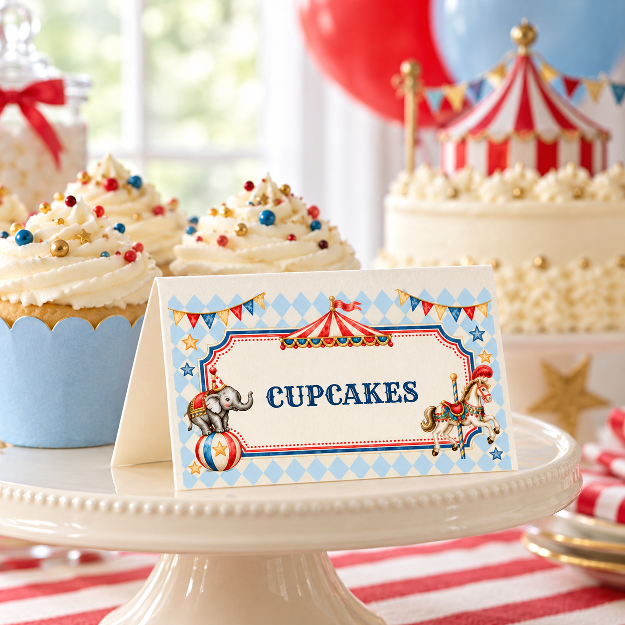 Vintage circus cupcake food tent card on a cream cake stand, with blue diamonds, an elephant and a carousel horse.