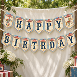 Vintage circus Happy Birthday banner hanging against a cream backdrop outdoors, surrounded by greenery.