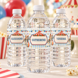 Three personalized vintage circus water bottles with blue diamond labels, circus tents, elephants and carousel horses.