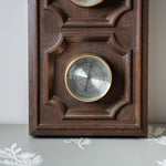 Mid century wooden wall weather station with rustic barometer and thermometer decor