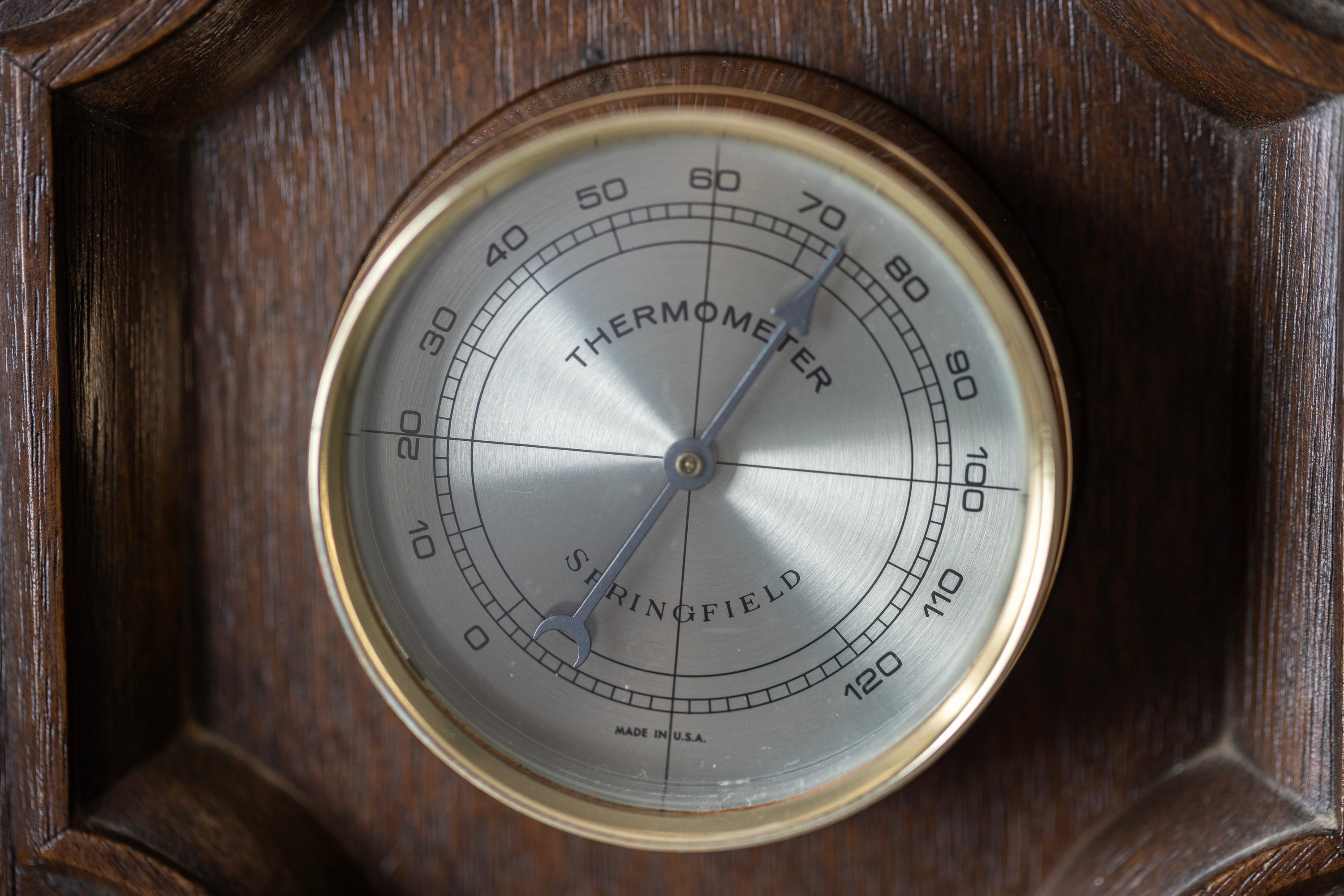 Rustic wooden weather station wall art with barometer and hygrometer details