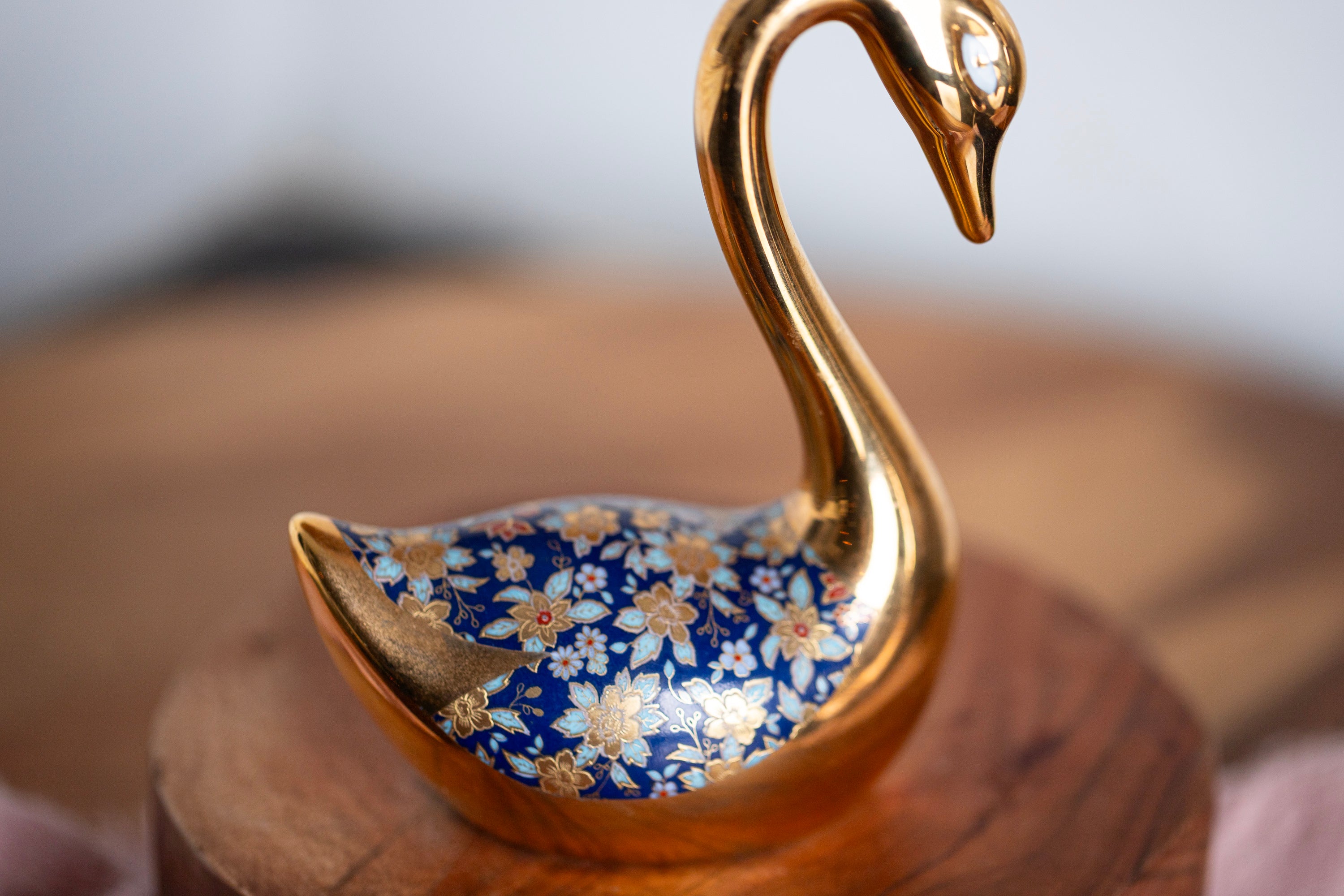 Spanish porcelain swan figurine with blue floral pattern