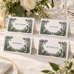 Four woodland wedding food tent cards labeled Appetizers, Salads, Desserts and Beverages on an ivory linen table.